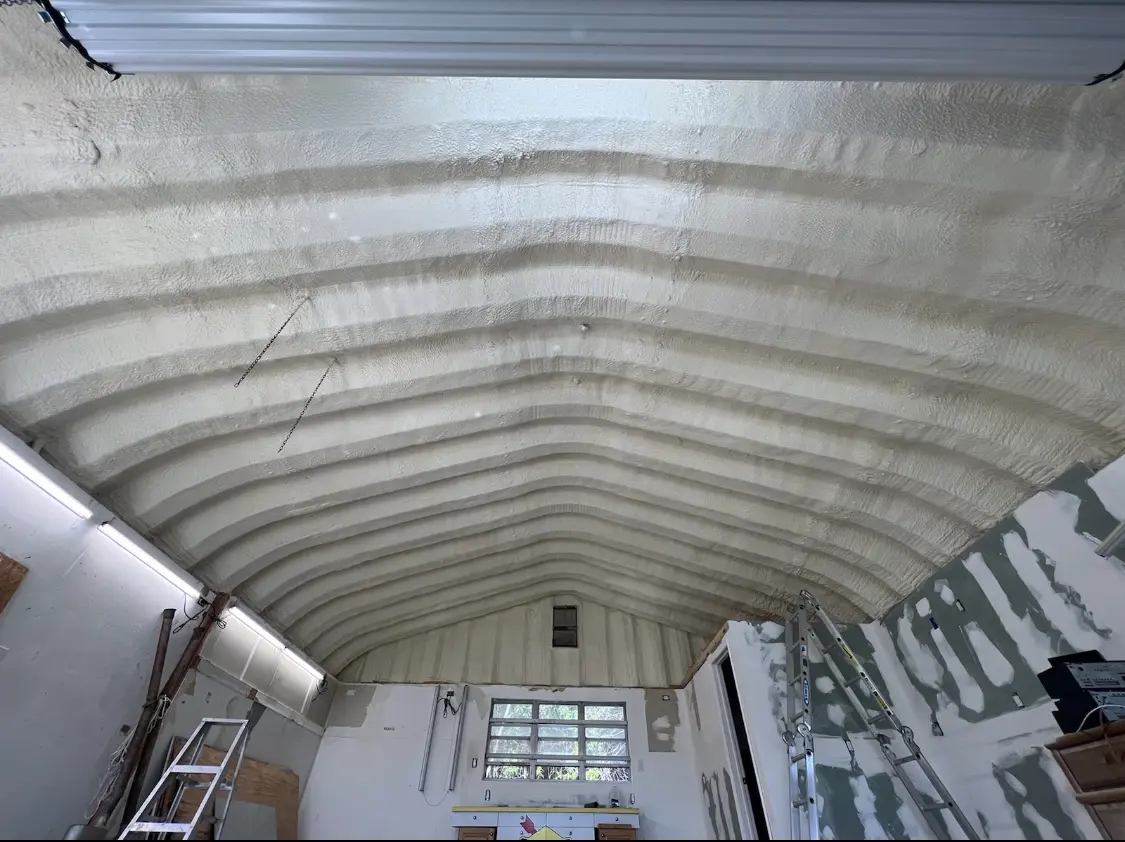 Spray polyurethane foam applied to the underside of a metal roof deck in Port LaBelle